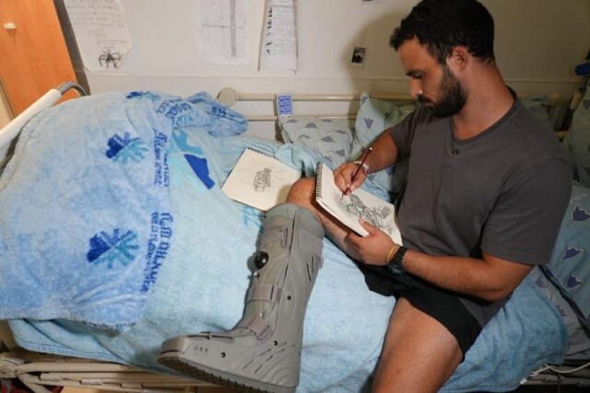 Barak, whose leg was shredded by a grenade during a hostage rescue mission in Gaza, draws