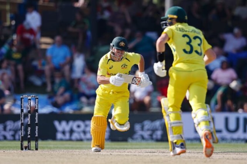 warner labuschagne hit centuries as australia go on batting rampage