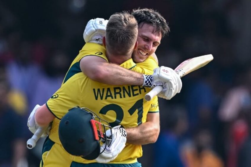 warner marsh star as australia down pakistan at world cup