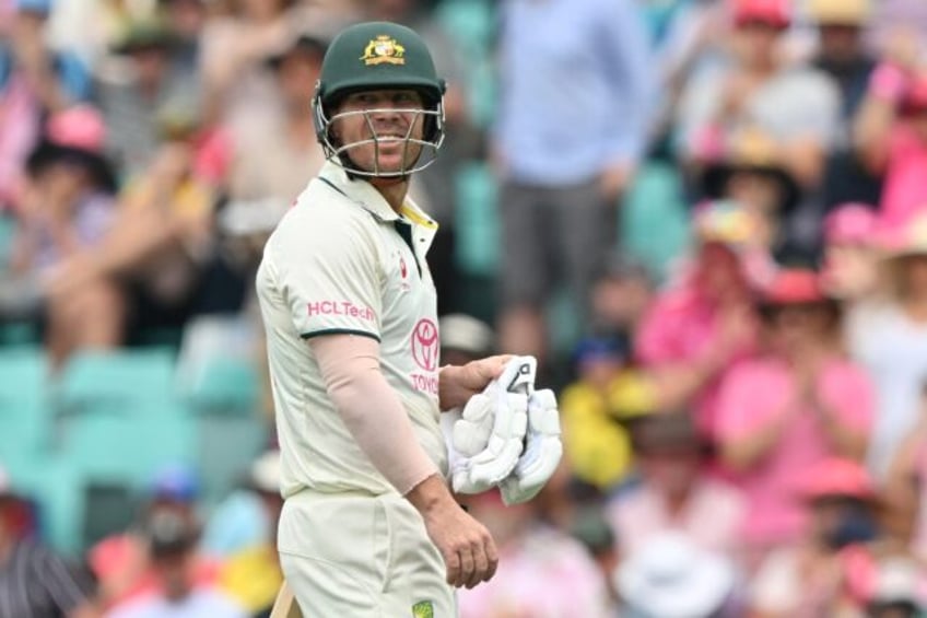 David Warner walks off the field after his dismissal