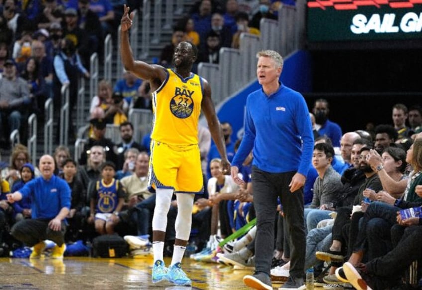 Golden State coach Steve Kerr (right) says the NBA's indefinite ban of Warriors star Draymond Green 'makes sense'