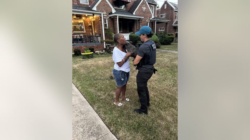 Woman reunited with her French bulldog