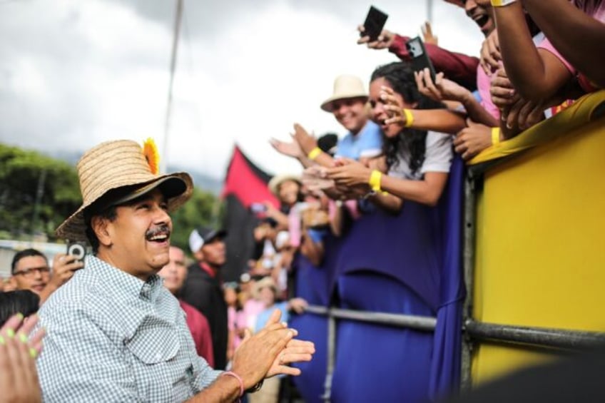 Venezuelan election officials said incumbent Nicolas Maduro won with 52 percent of votes c