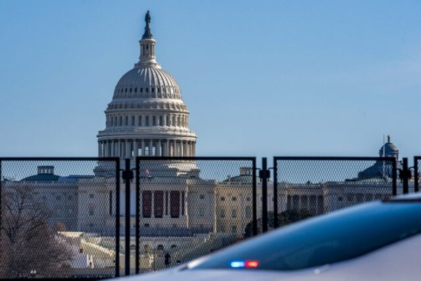 Metal fencing has been up around the US Capitol, where the inauguration ceremony is held,