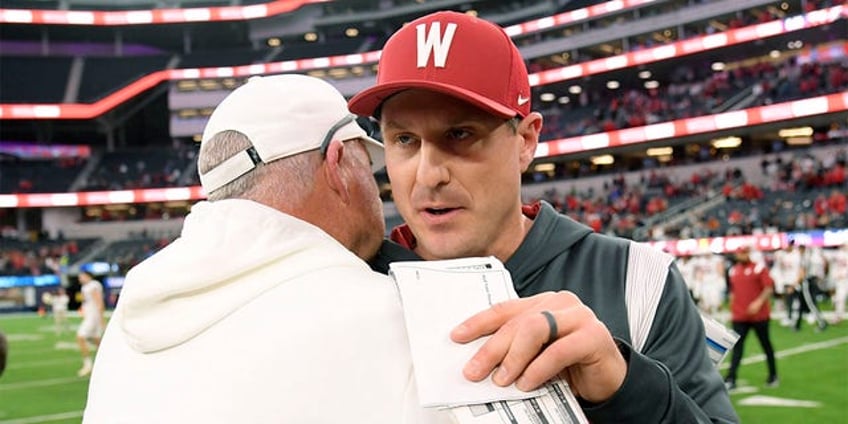 washington state head football coach reacts to conference realignment what are we doing