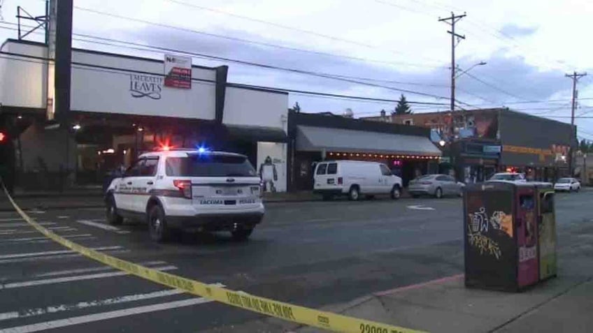 washington suspect turns self in after bar shooting kills 2 injures 3