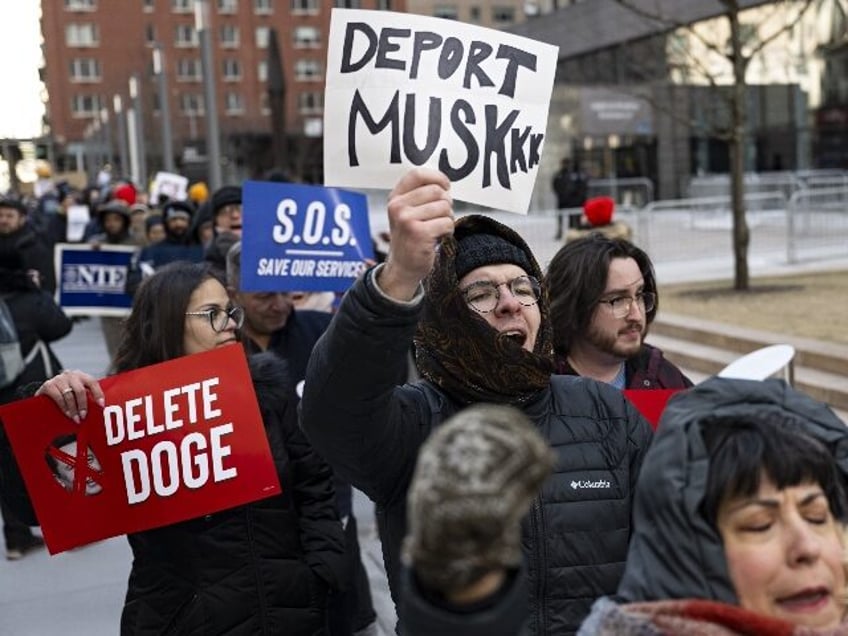 NEW YORK, UNITED STATES - February 19: People holding banners chant during a rally outside