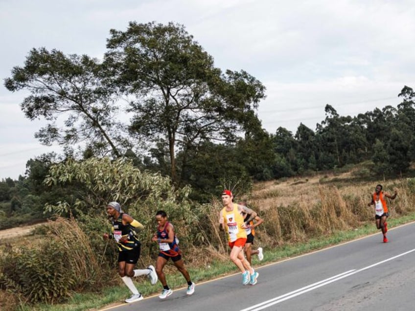 Runners take part in the 89 kilometres Comrades Marathon between Pietermaritzburg and Durb