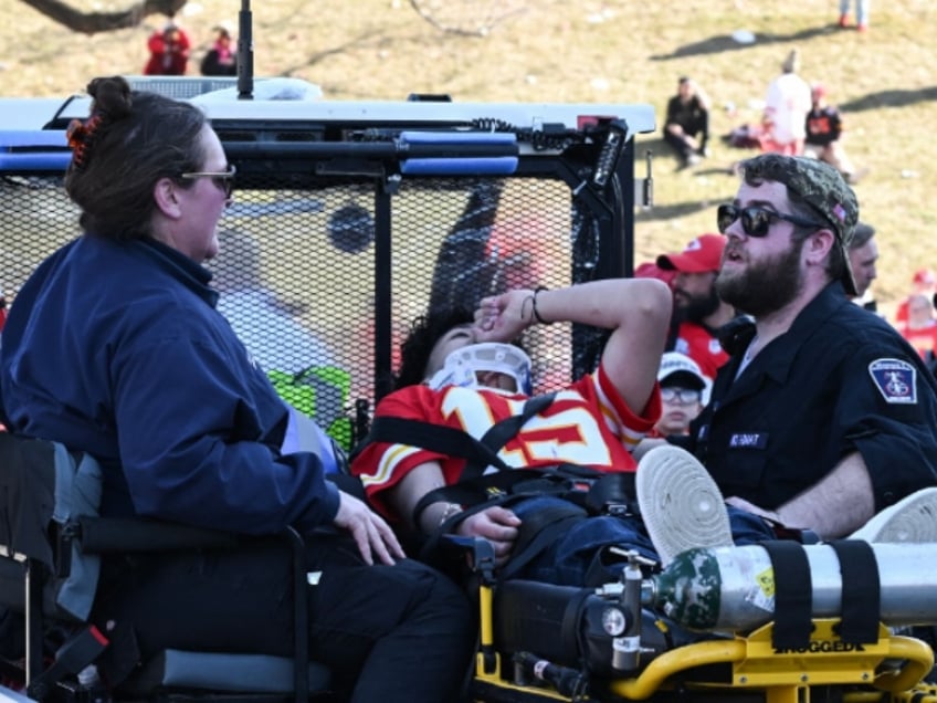 watch armed man tackled by kansas city chiefs fans arrested by police