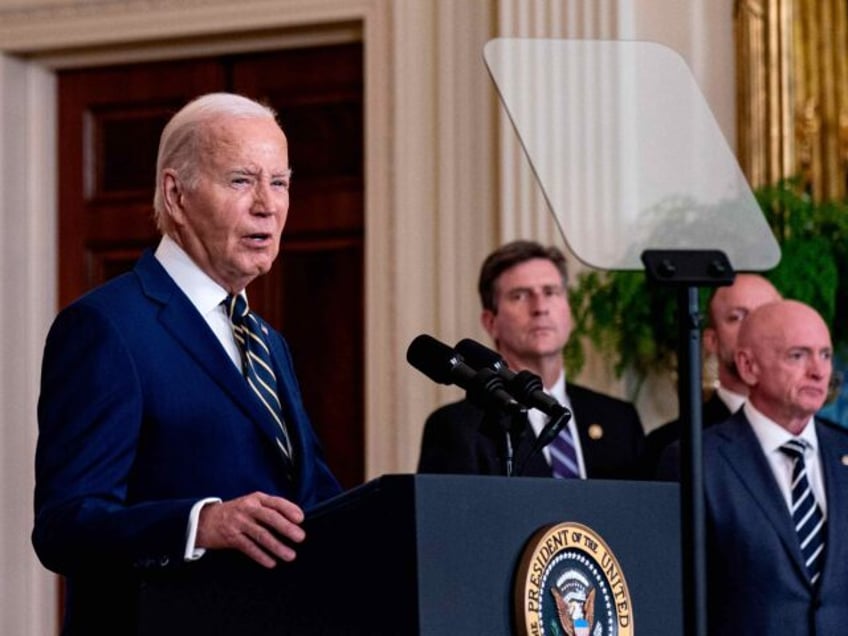 US President Joe Biden speaks in the East Room of the White House in Washington, DC, US, o