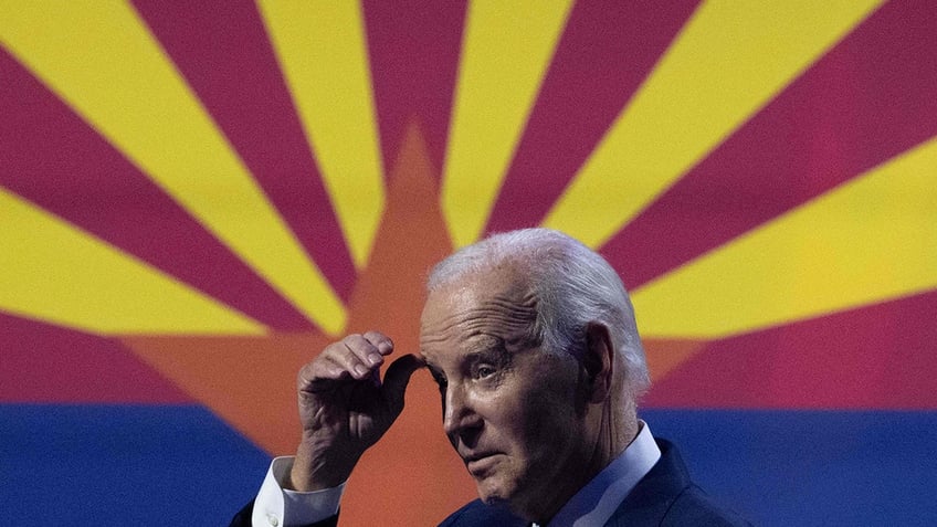 watch biden interrupted by climate protester tells heckler that he will meet him immediately after speech