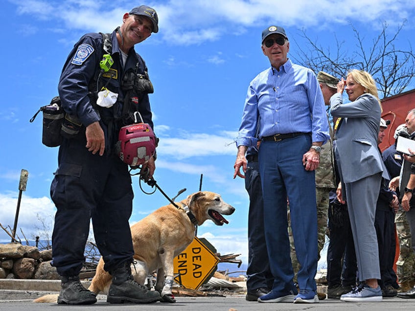 watch biden jokes about the hot ground while visiting maui wildfires you guys catch the boots here