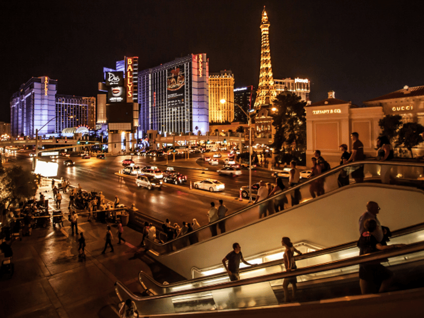 Las Vegas, NV - people walking on street during night time