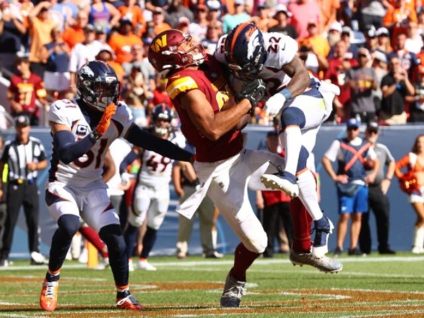 watch broncos kareem jackson ejected after vicious hit on commanders logan thomas