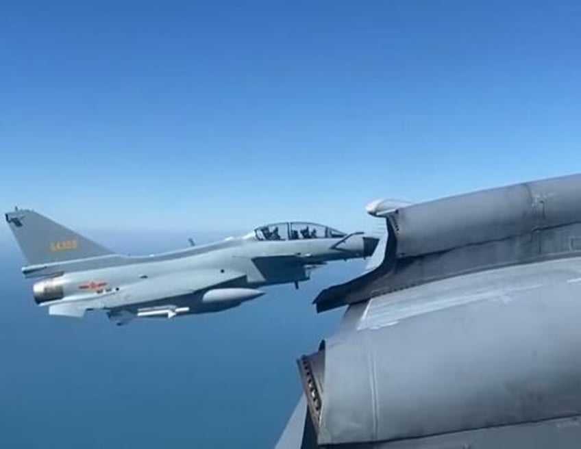 watch chinese jets come within 5 meters of canadian spy plane in very aggressive intercept