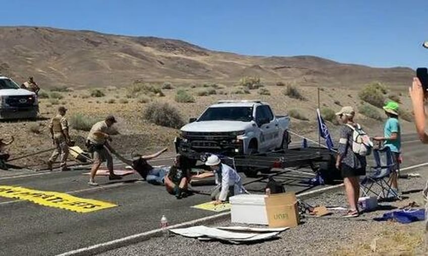 watch climate commies blocking burning man taken down hard by tribal cops