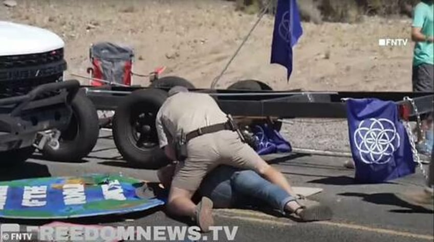 watch climate commies blocking burning man taken down hard by tribal cops