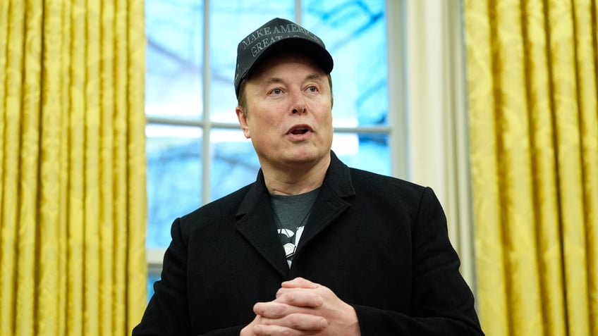 Elon Musk speaks during an event in the Oval Office with President Donald Trump at the White House on Feb. 11, 2025.