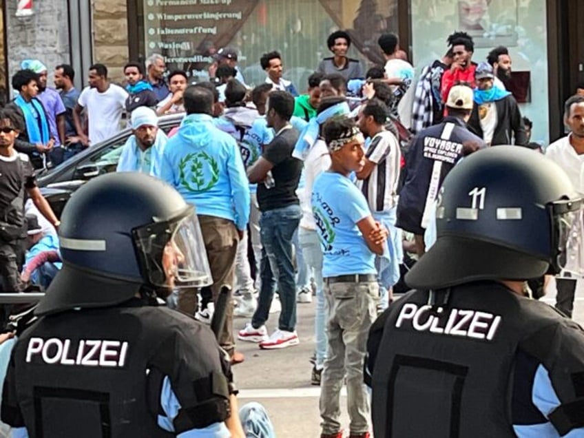 watch dozens injured during unrest at eritrean cultural festival in germany