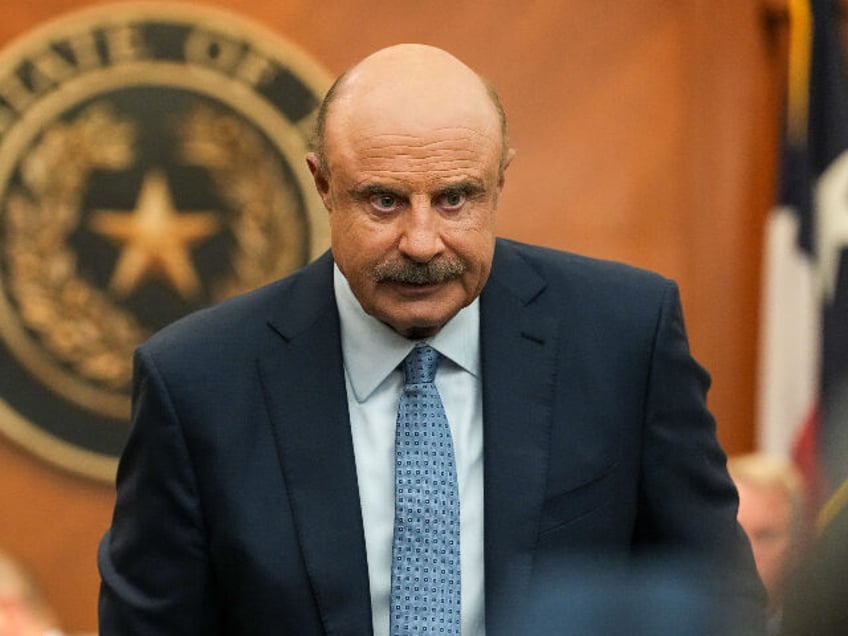 AUSTIN, TEXAS - OCTOBER 21: Phil McGraw, known as Dr. Phil, leaves after testifying in a T