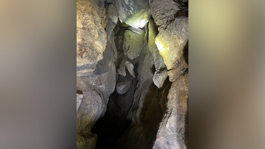 watch dramatic rescue of trapped tennessee dog named charlie just 5 feet below bear in deep cave