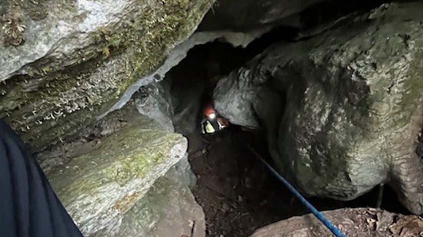 watch dramatic rescue of trapped tennessee dog named charlie just 5 feet below bear in deep cave