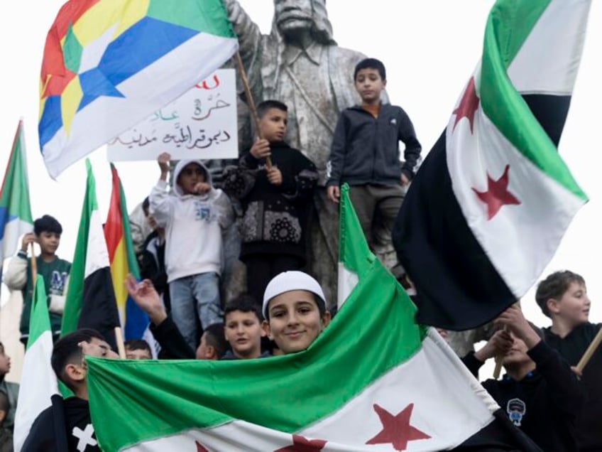 MAJDAL SHAMS, GOLAN HEIGHTS - DECEMBER 9: People celebrate at the main square of the Druze