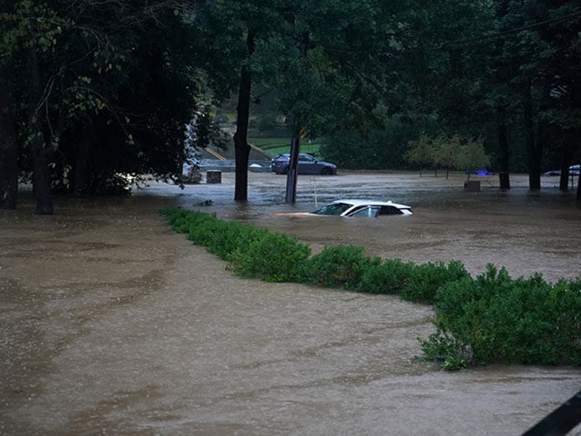 A car is submerged in the floodwaters in the Buckhead neighborhood in the aftermath of Hur