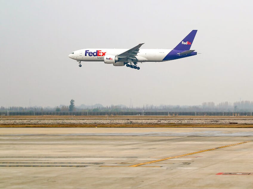 Flight FX5286 operated by FedEx lands at Qingdao Jiaodong International Airport in Qingdao