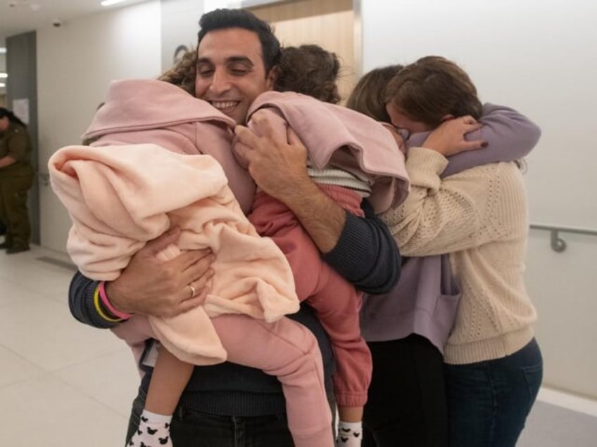 watch first families reunited after israeli hostages freed