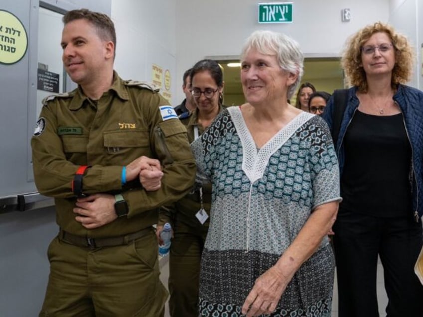 watch first families reunited after israeli hostages freed