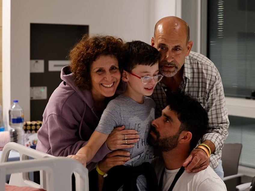 watch first families reunited after israeli hostages freed