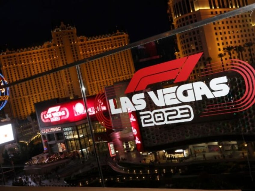 watch formula one grand prix car shoots flames thanks to bad track hazard on las vegas strip