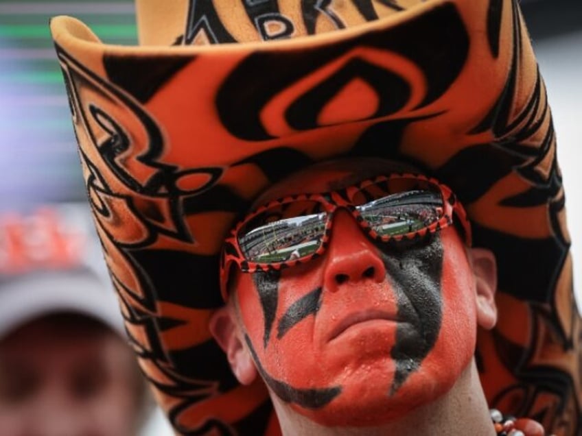 watch handcuffed bengals fan delivers perfect head butt while getting arrested as cincinnati loses again