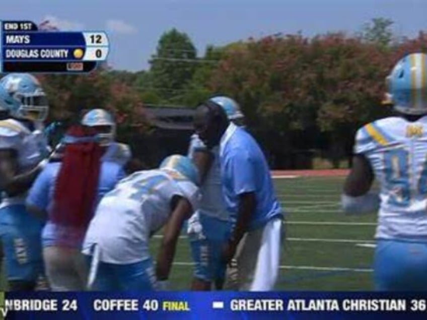 watch high school football coach arrested after appearing to punch player in the stomach