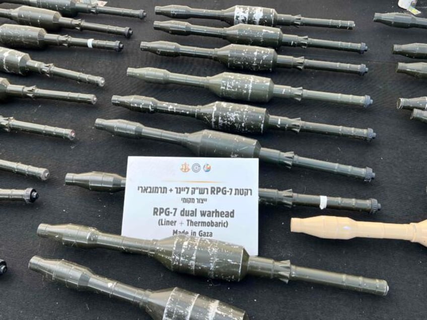 watch idf reveals arsenal of weapons seized from hamas anti tank explosives used to kill civilians