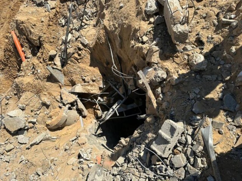 watch idf uncovers hamas tunnel next to shifa hospital in gaza