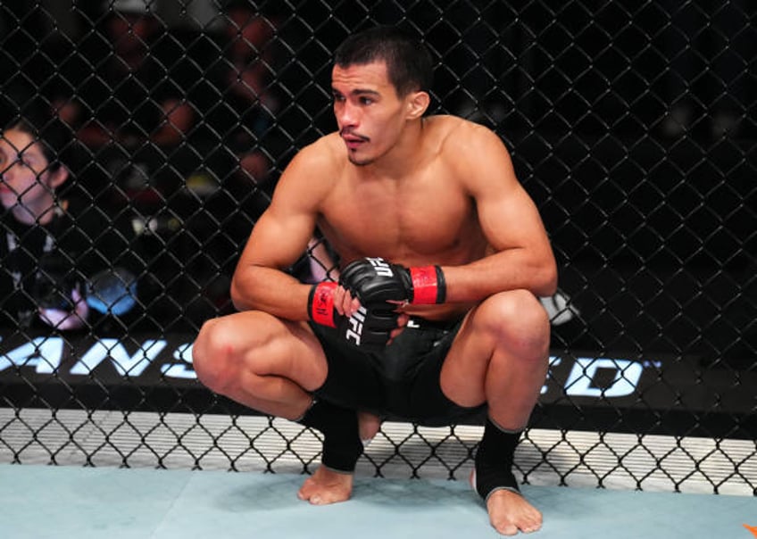 Igor Severino of Brazil reacts during a flyweight fight against Andre Lima of Brazil during the UFC Fight Night event at UFC APEX on March 23, 2024...