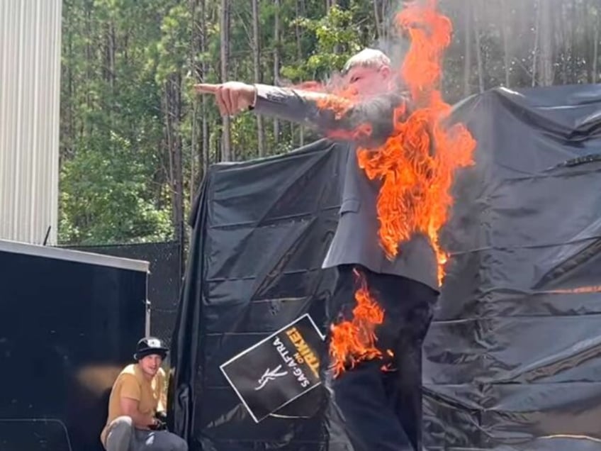 watch indiana jones stunt performer lights himself on fire in support of hollywood strike