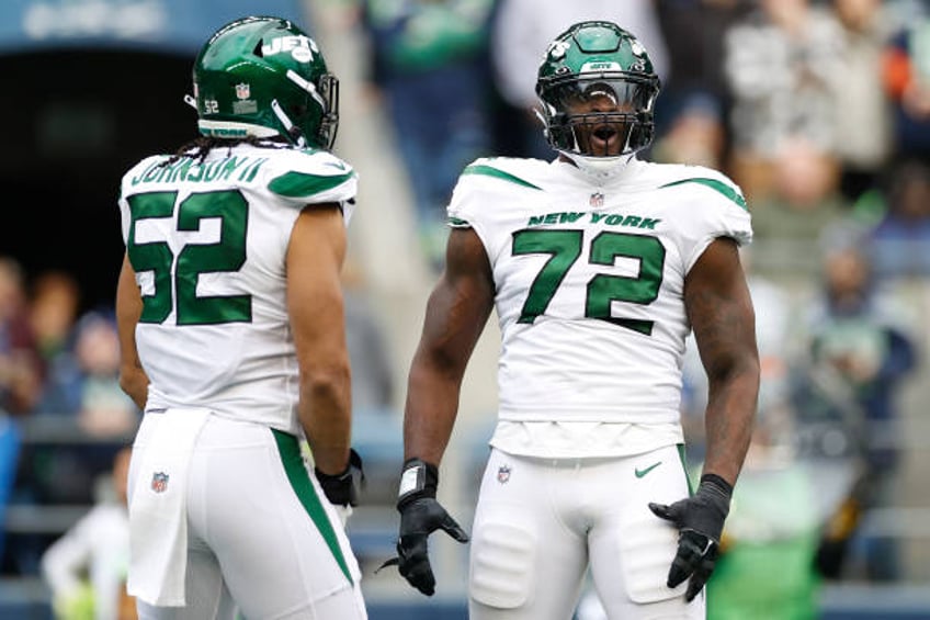 Micheal Clemons of the New York Jets reacts after a sack during the second quarter in the game against the Seattle Seahawks at Lumen Field on January...