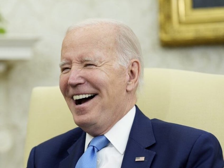 watch joe biden laughs off question on if he will give his bank records to congress for hunter probe