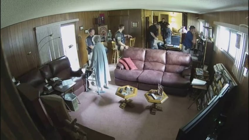 watch kansas 98 year old makes first amendment stand as deputies raid home get out of my house