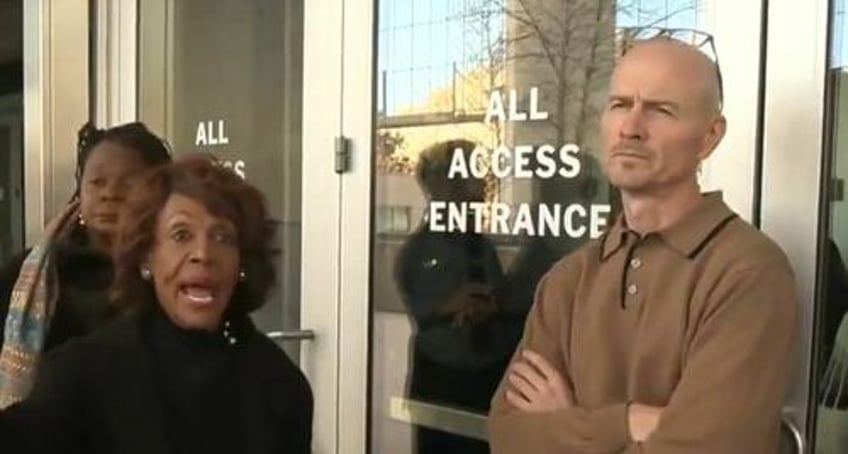 watch maxine waters flips her wig as dept of education employee blocks path