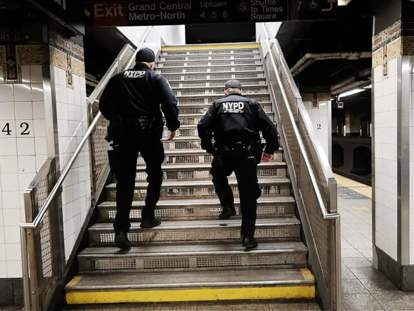 watch men attack nypd cop for asking them to stop smoking on subway platform