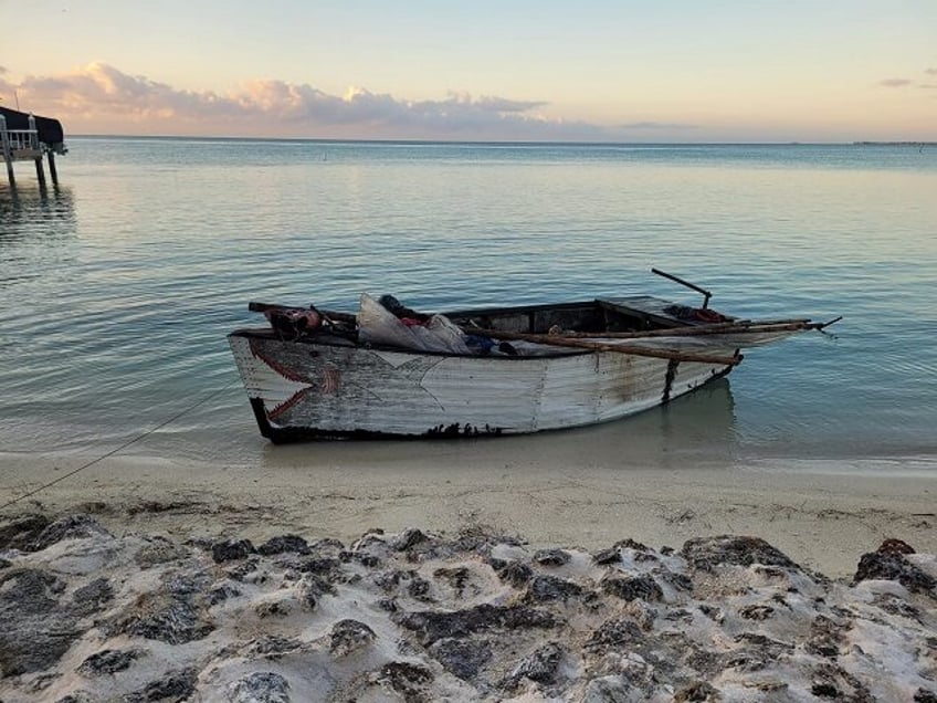 migrant - Cuban migrants apprehended after a makeshift boat landed in the Florida Keys. (U