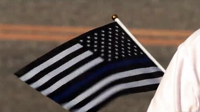 watch mother of fallen cop slams city officials for not flying thin blue line flag using pride flag instead