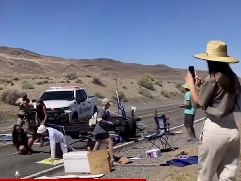 watch nevada tribal ranger plows through activists highway protest