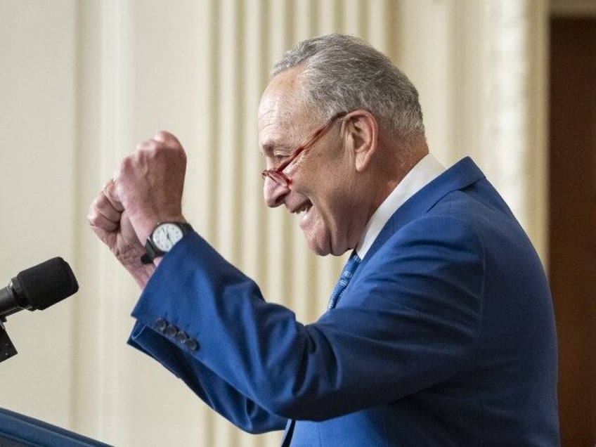 Senate Majority Leader Chuck Schumer (D-N.Y.) delivers remarks at the signing of H.R. 5376