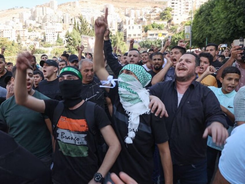 watch palestinians celebrate massive terror attack against israeli civilians