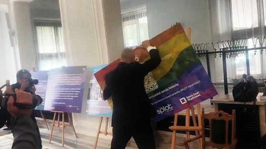 watch polish mep destroys lgbtq exhibition gets banned from polish parliament building